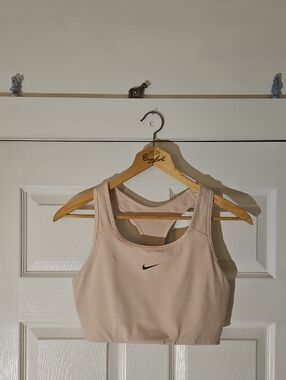 Nike Pale Pink Racerback Sports Bra with Black Swoosh